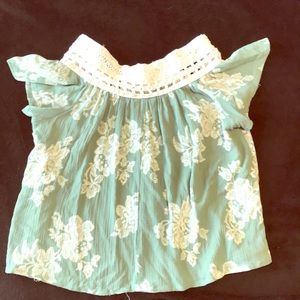 Green and white blouse