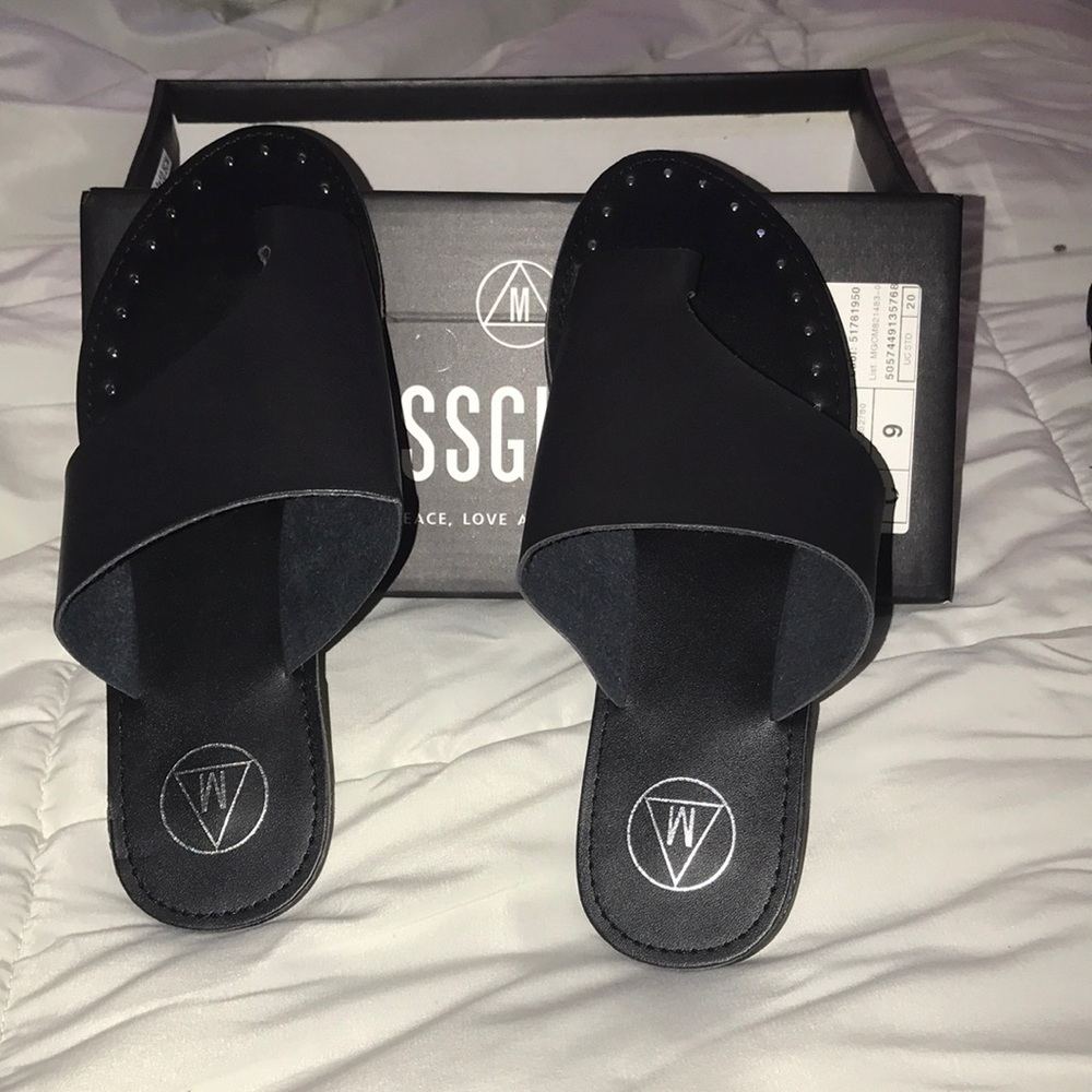 Black faux leather flat studded sandals