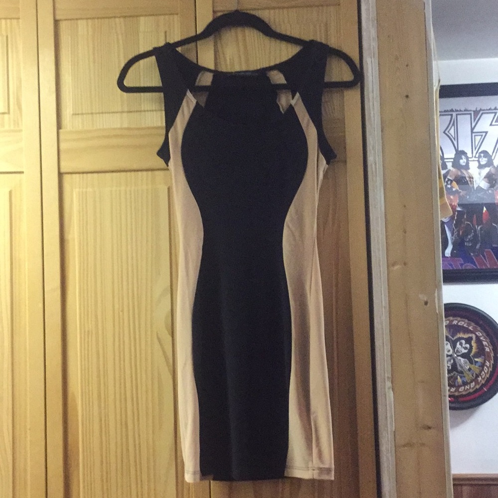 Gently worn once black and beige dress