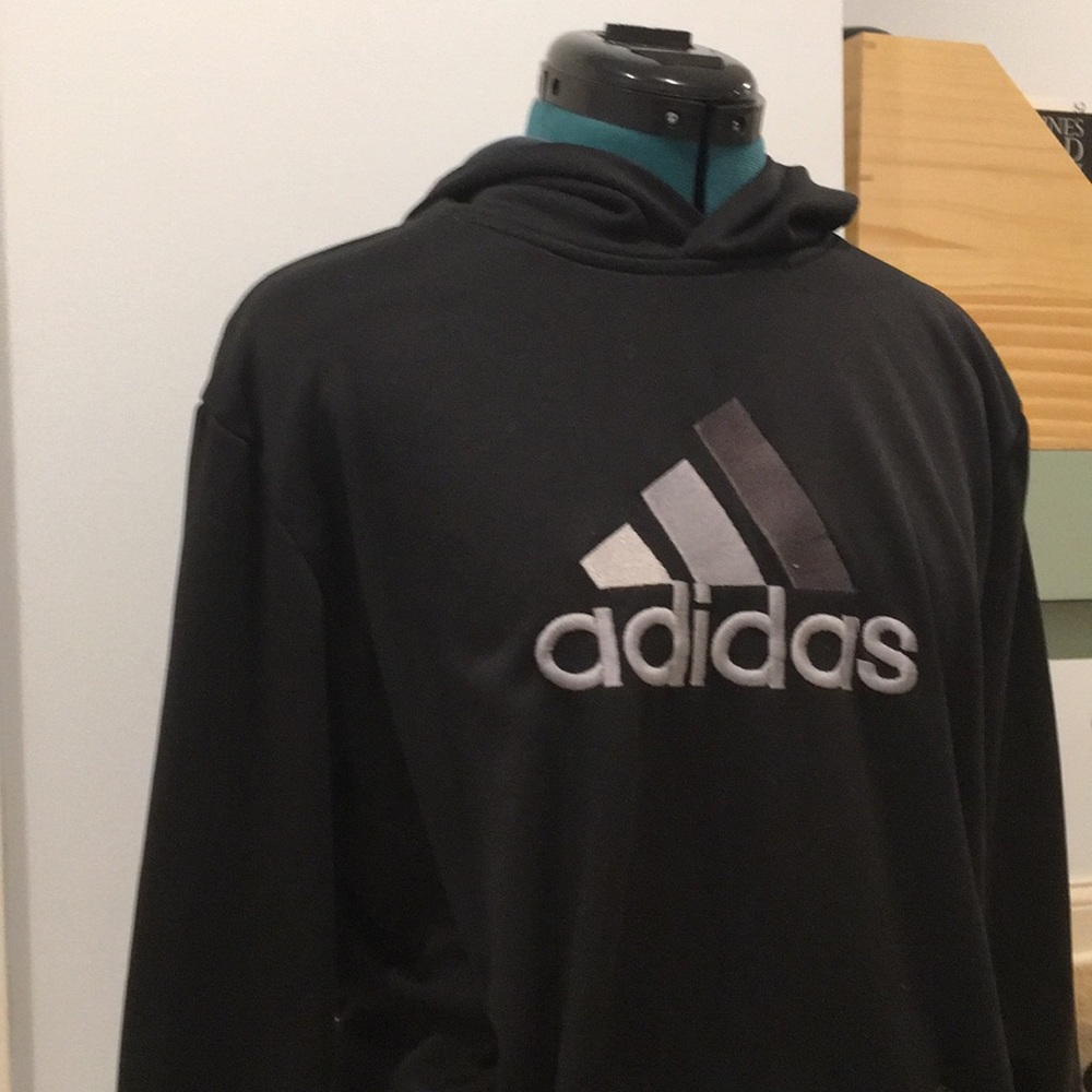 Black adidas hoodie.