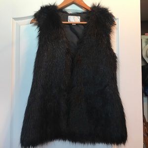 Black faux fur vest