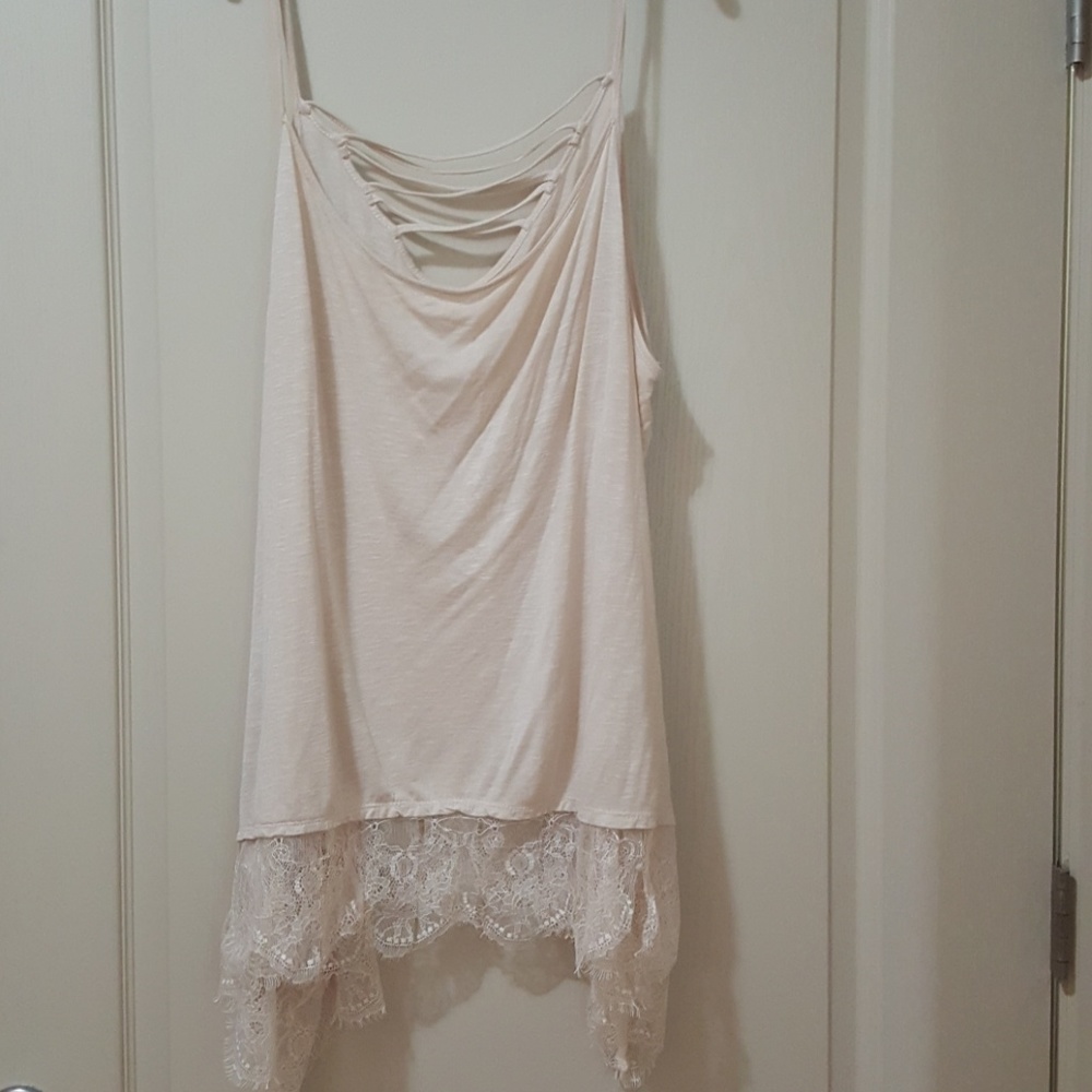 Cute top with a few flaws as shown in pics
