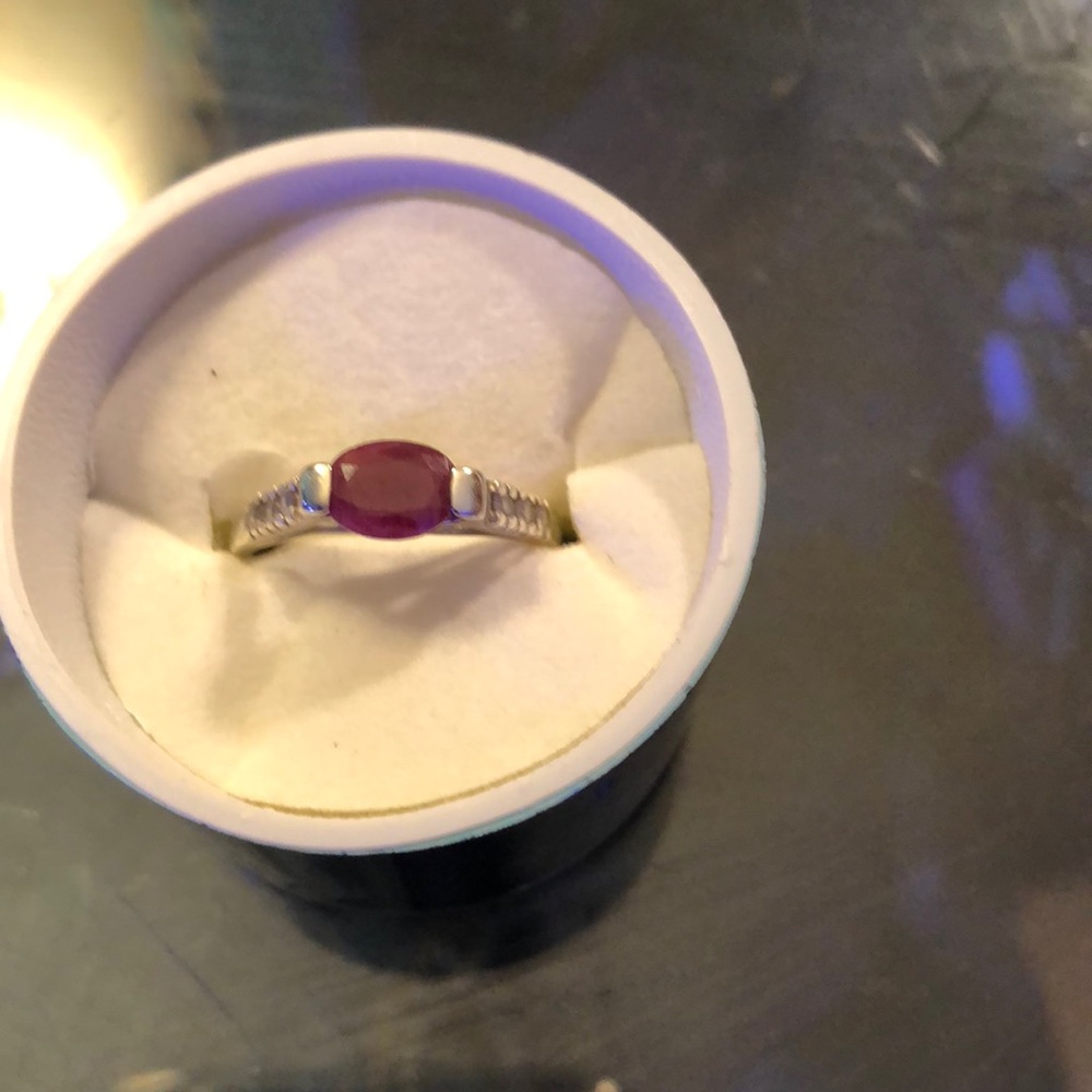 Sterling silver ring with purple stone