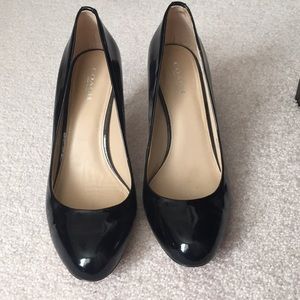 Coach black pumps