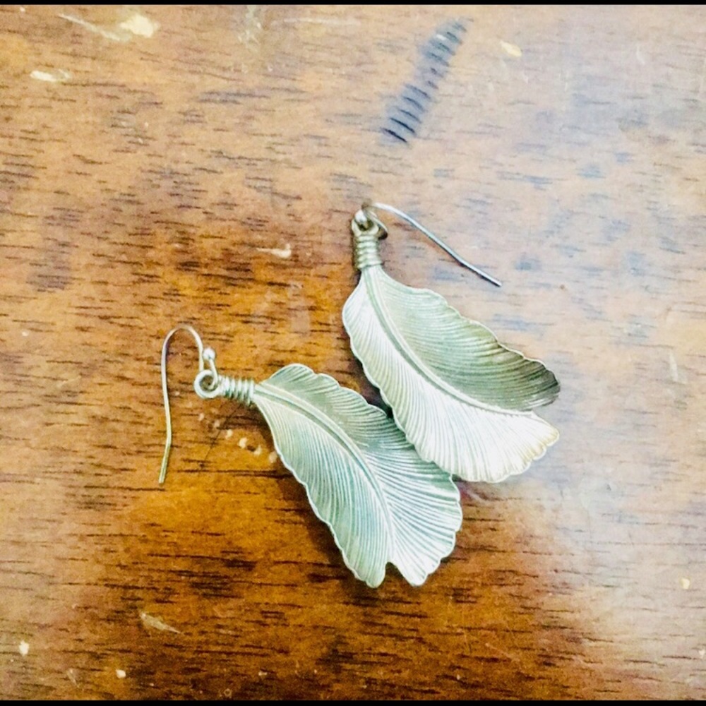Gold feather earrings