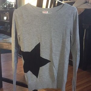 Gray sweater with black star