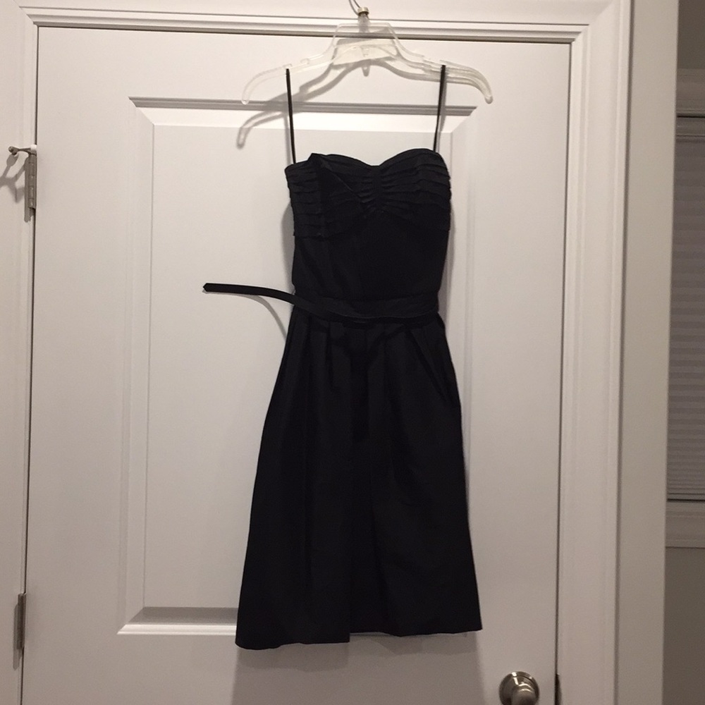 Great strapless flare out at waist black dress