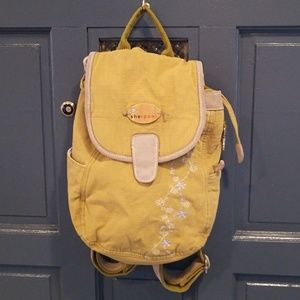 Sherpani cloth backpack with adjustable straps.