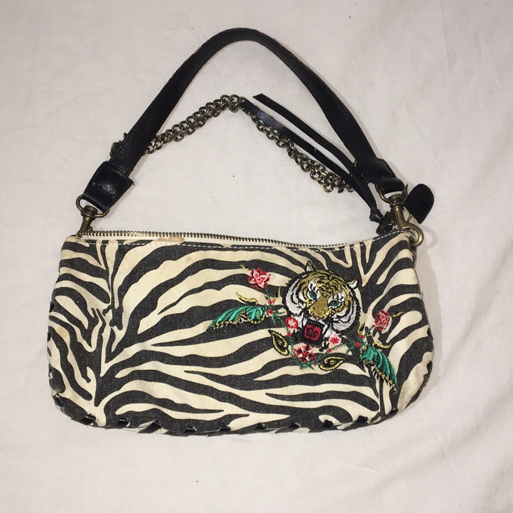 Tiger embroidered clutch with leather trim