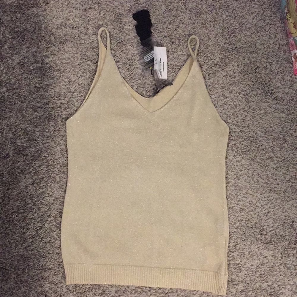 Super cute gold sparkle tank top.  Size M