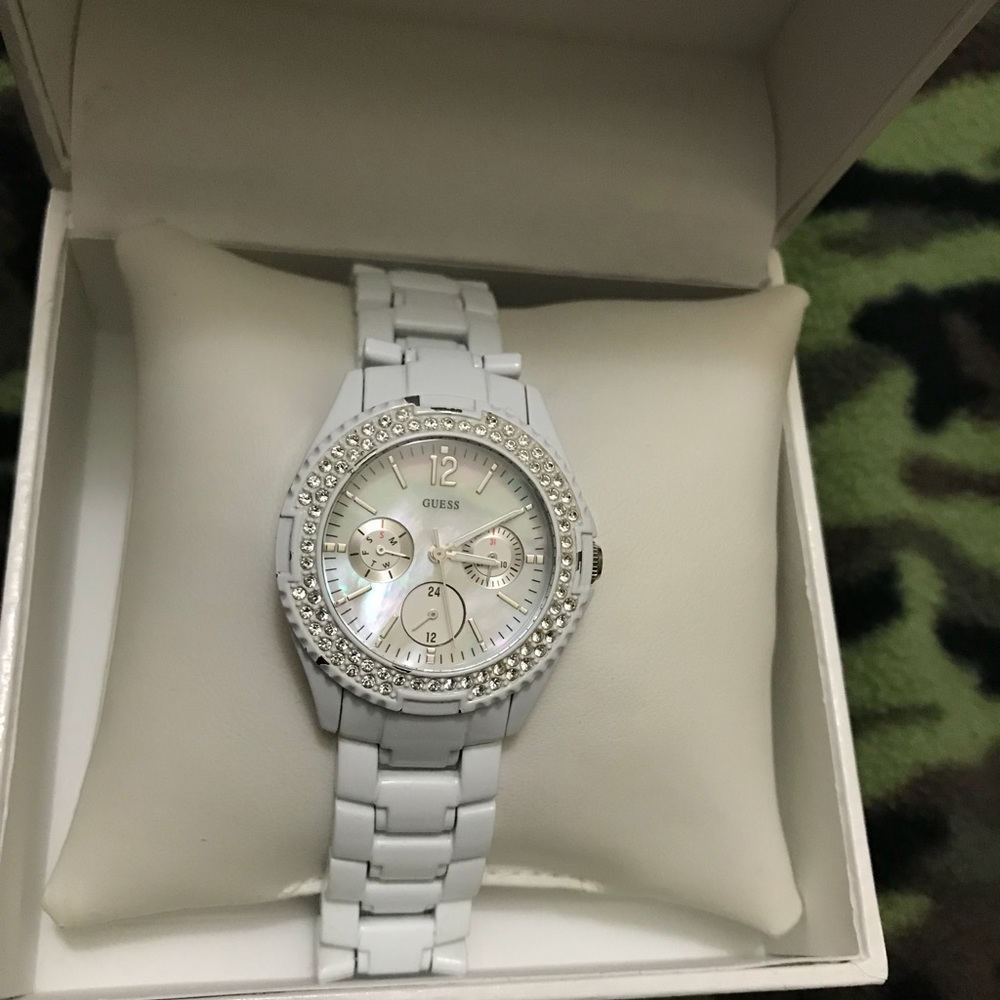 Women’s white guess watch