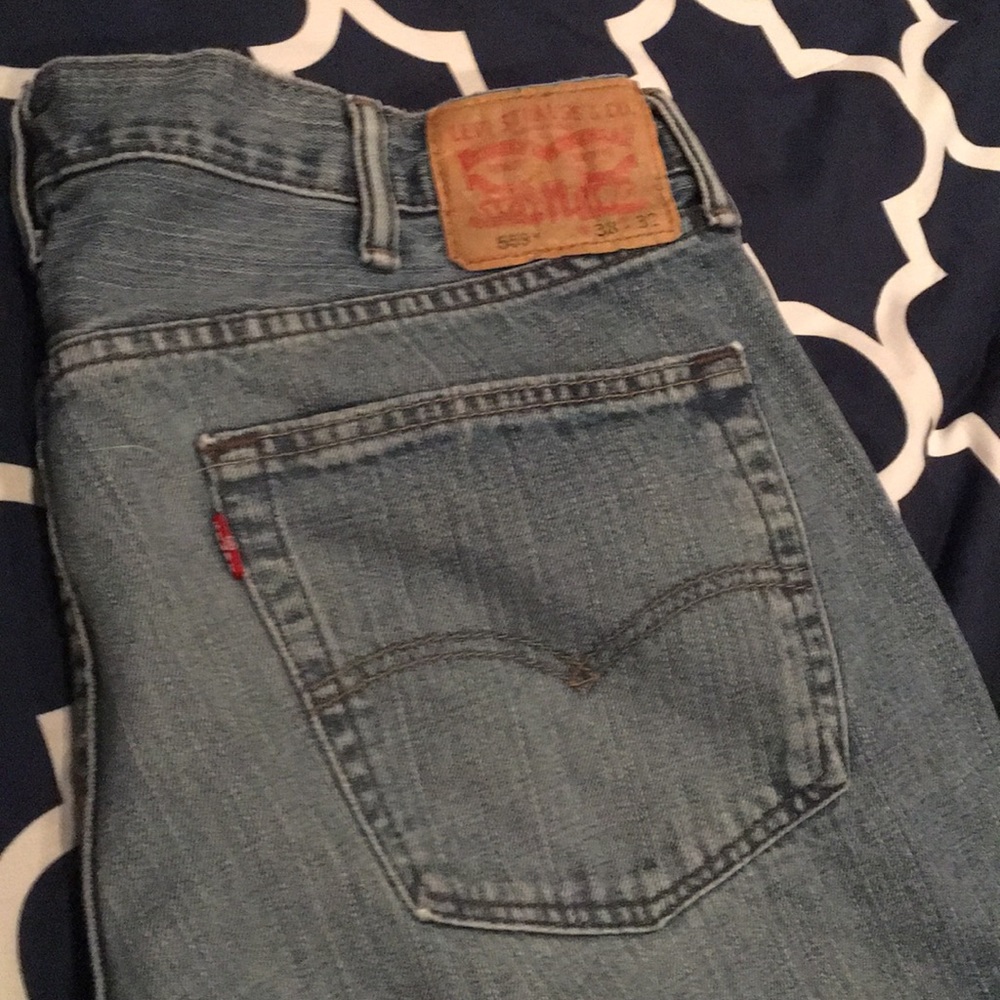 Jeans small stain on left side under pocket