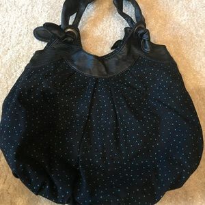 Blue polka dotted purse