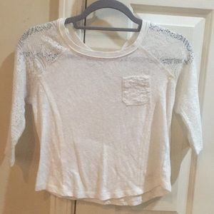 A kids lace shoulders top