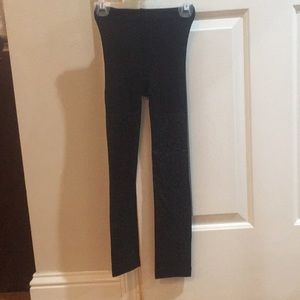 Black legging with cheetah print.