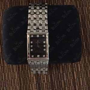 Bulova men's watch with small diamond hour markers