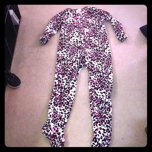 Fuzzy onesie with footed pads and leopard pattern