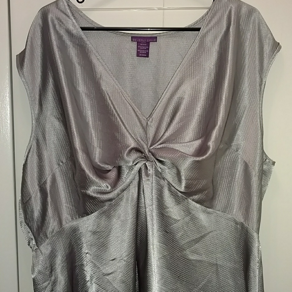 Shiny silver sleeveless front knot top