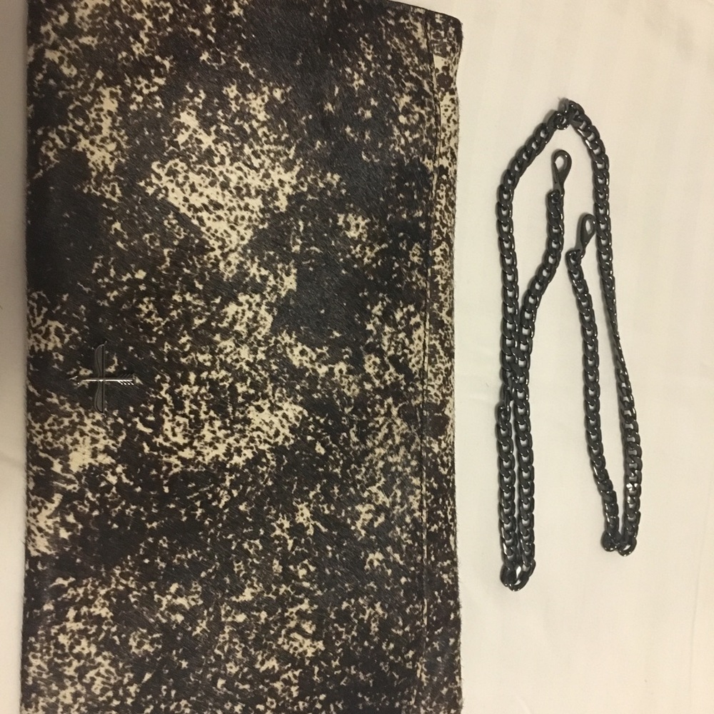 Brand new (no tags) Pour Le Victoire clutch.