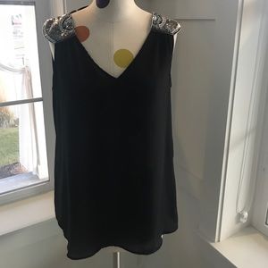 Edgy black tank