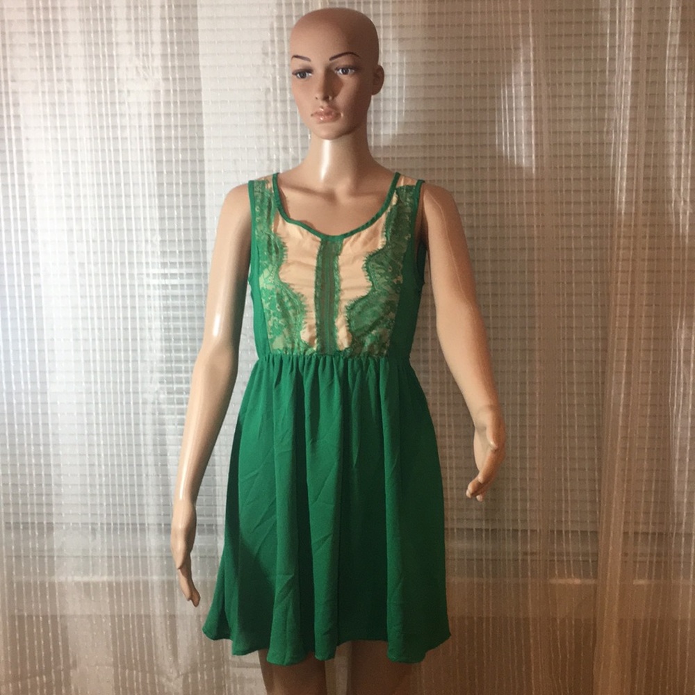 Green and lace mini dress