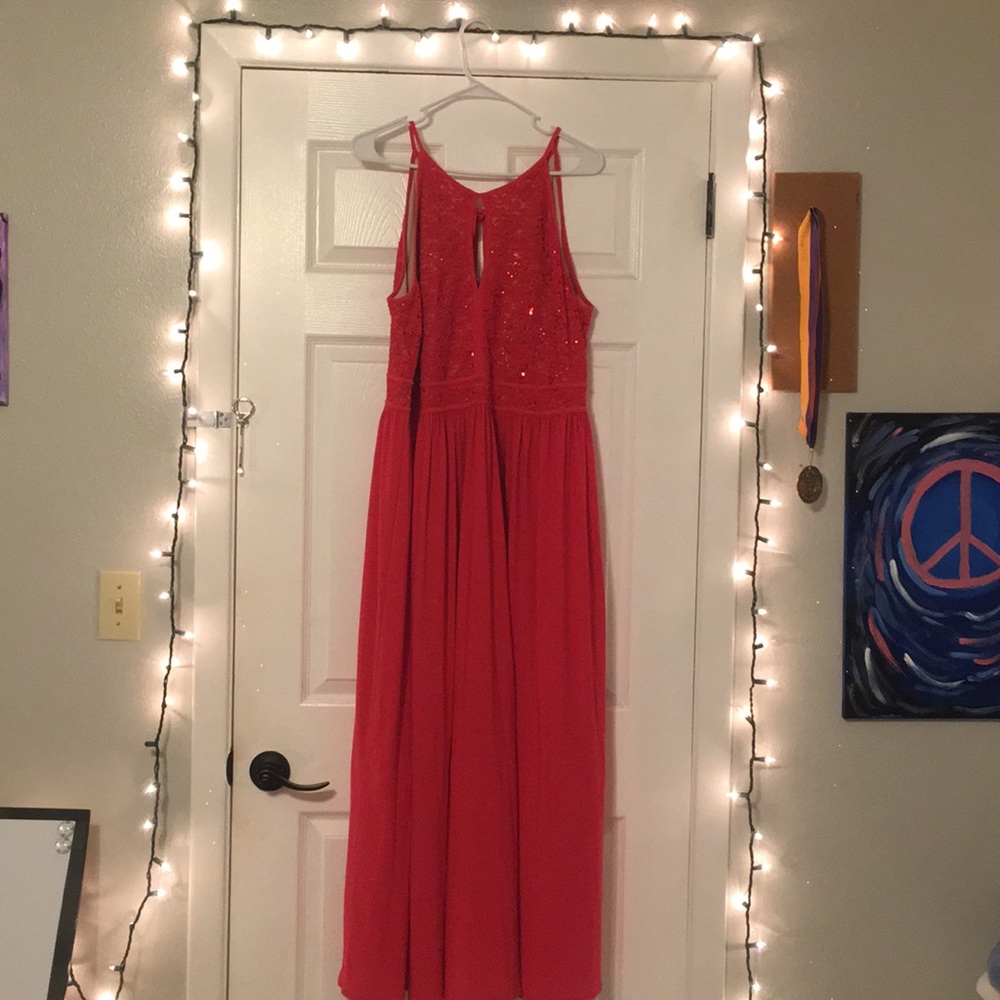 A coral/red prom dress