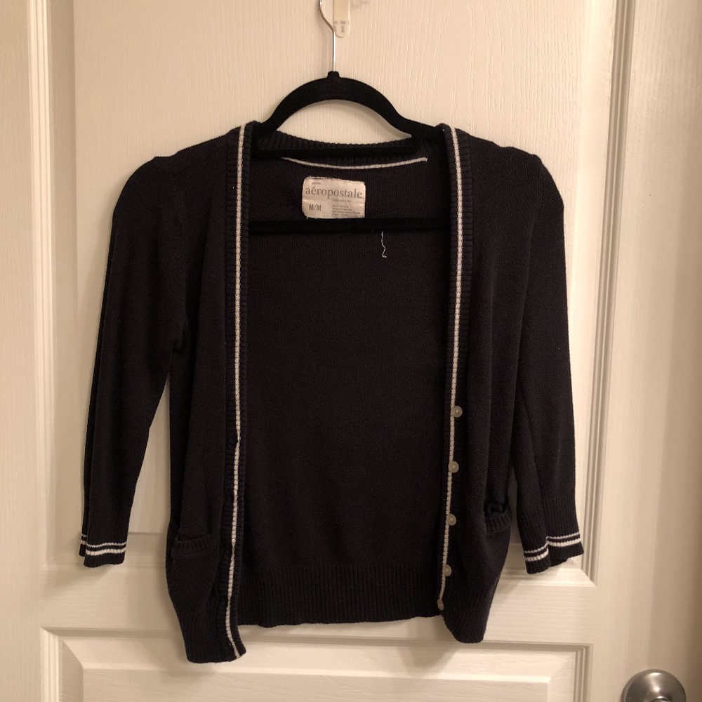 Black cardigan with white lining
