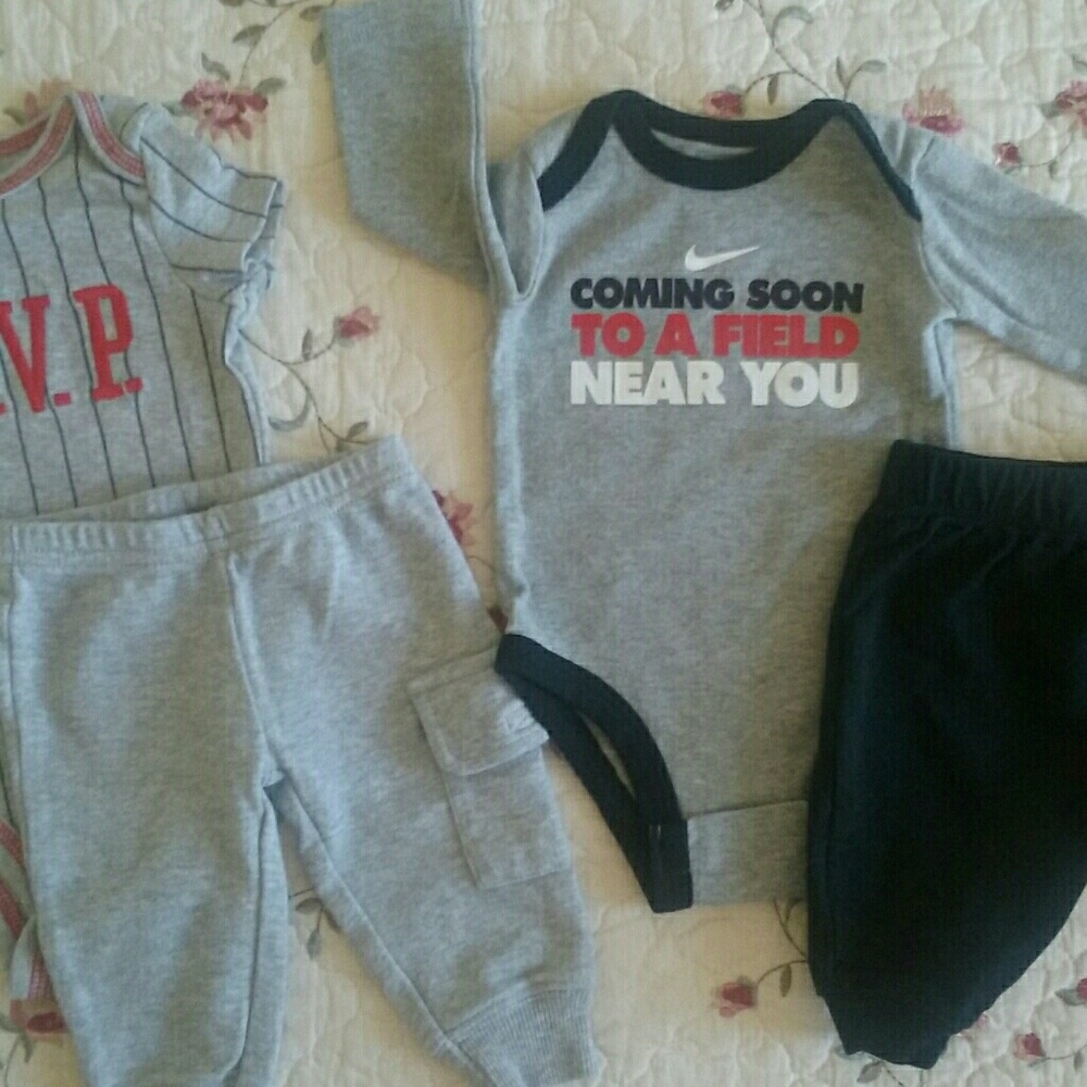 1 Nike matching set and 1 Carters set