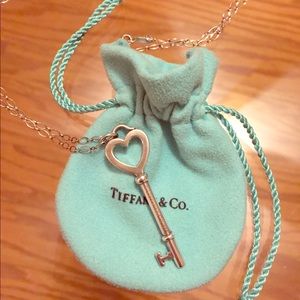 2" sterling silver Tiffany heart key & 24" chain.