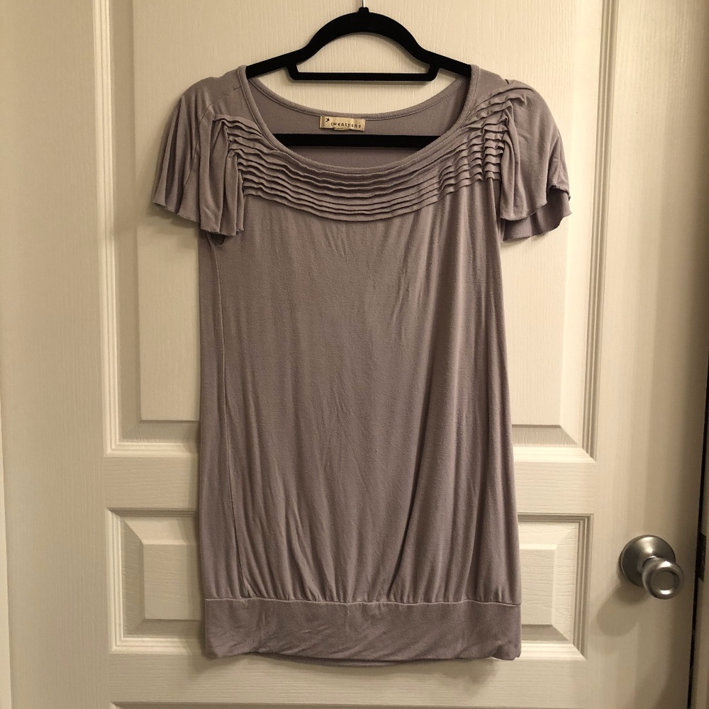 Grey ruffled top