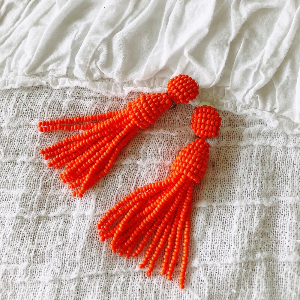 Orange tassel earrings
