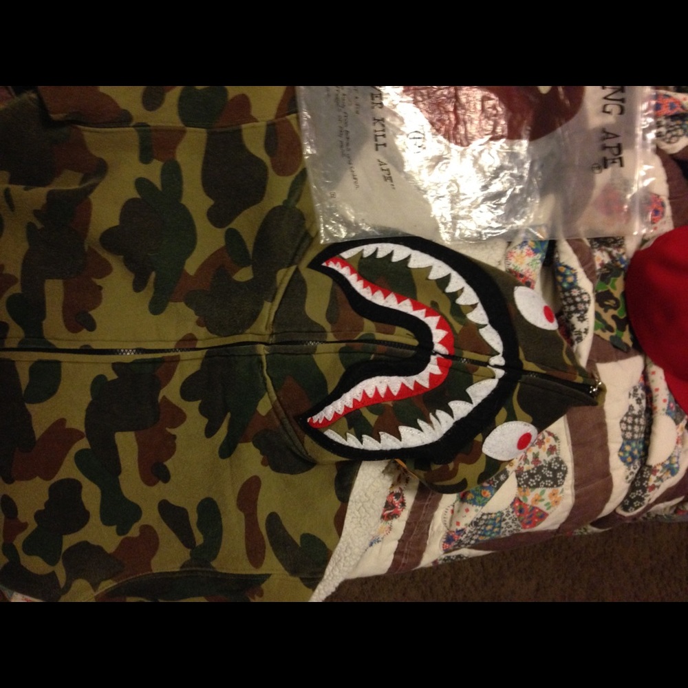 Brand new bape zip up hoodie. With tags and bag.