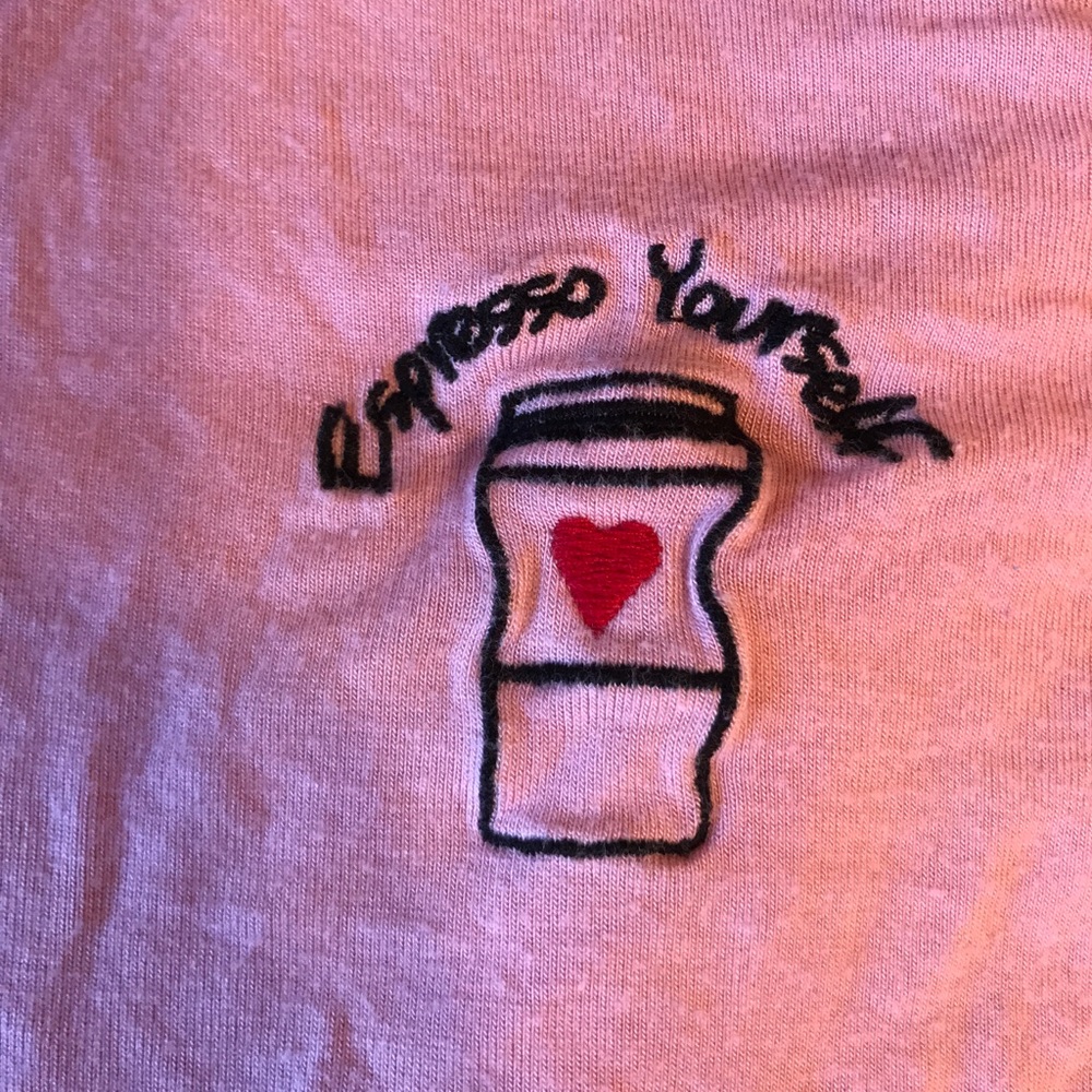 Light pink blouse w curled hems and adorable patch