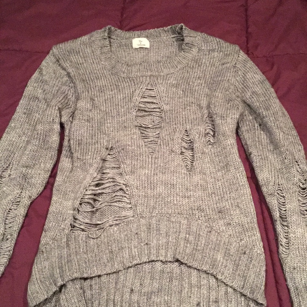 Distressed knit sweater