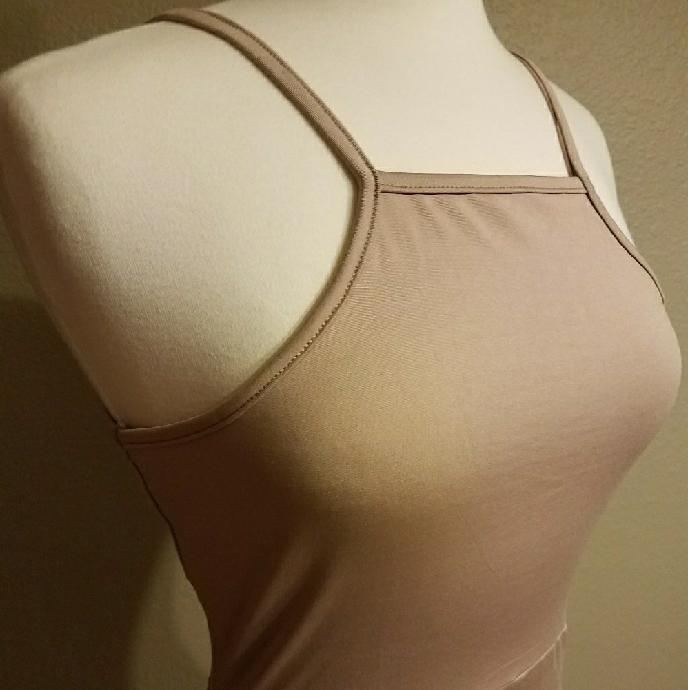 Sexy Nude dress with asymmetrical hemline.