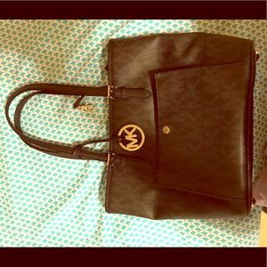 Black medium sized Michael Kors handbag