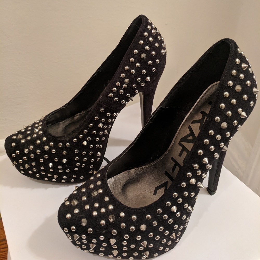 Studded black pumps