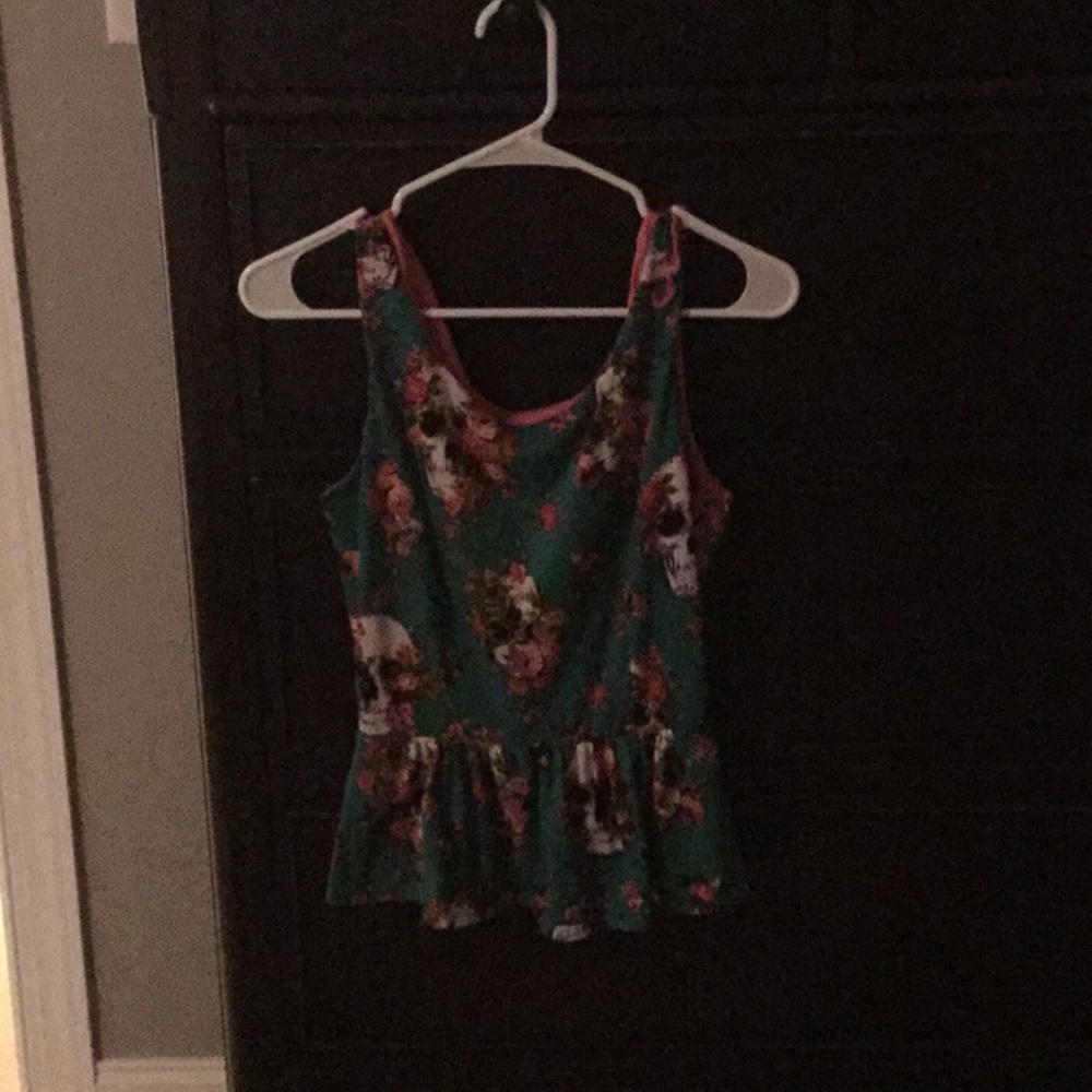 Skull/flower peplum top