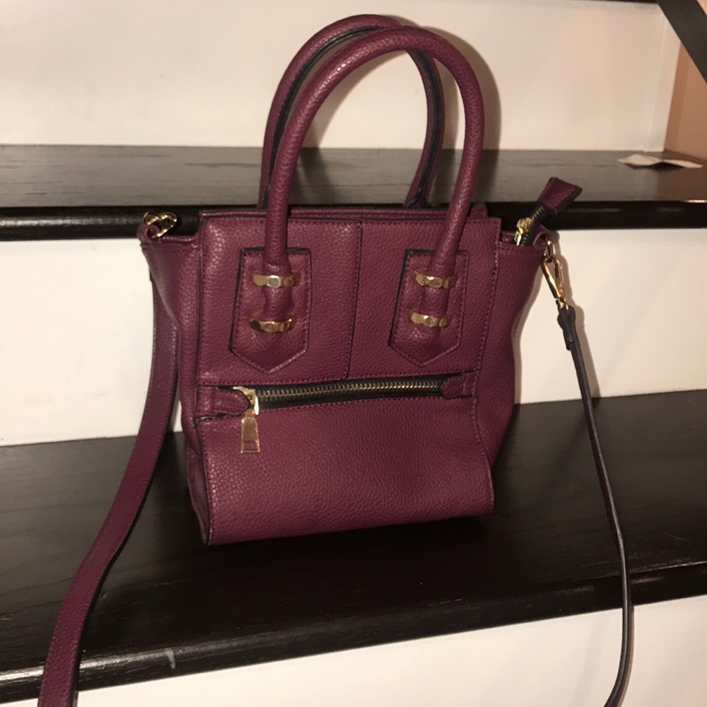👜