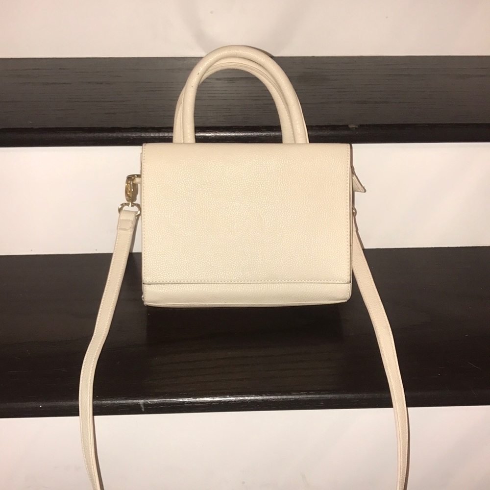 👜