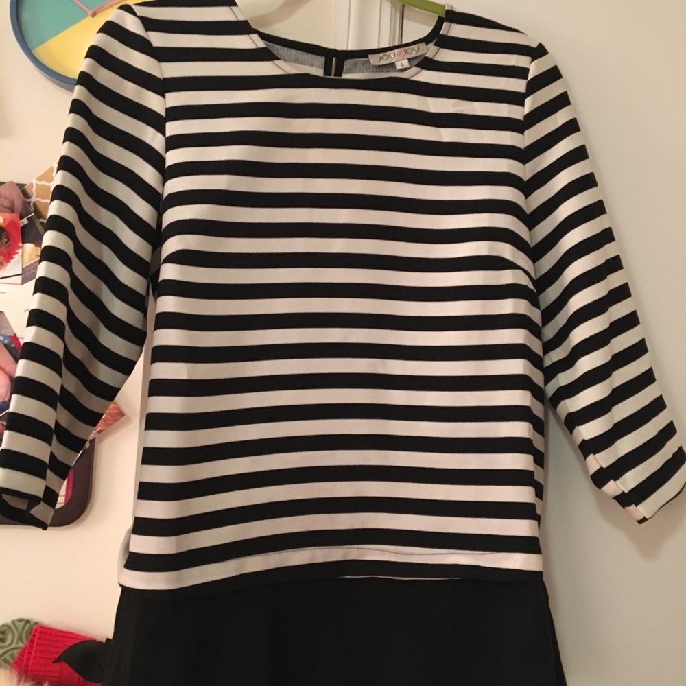 Striped black and white shirt with a ruffle