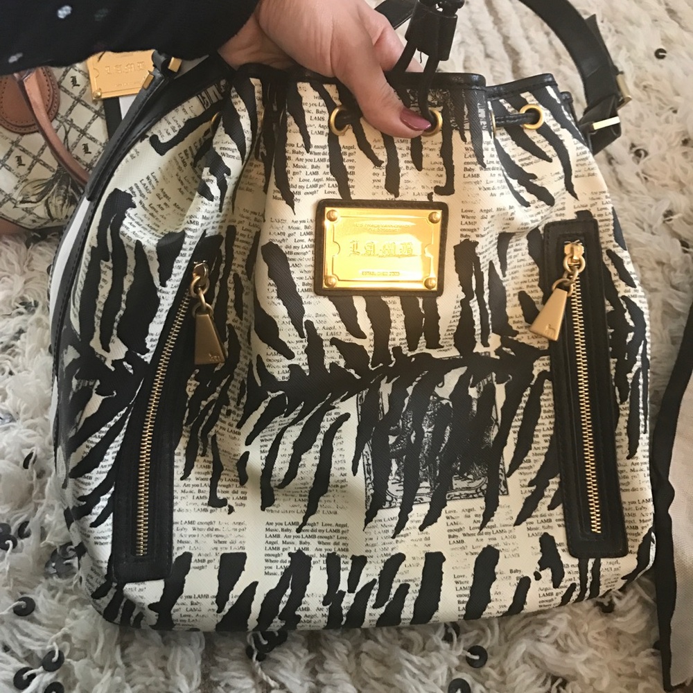 L.A.M.B animal newspaper print tote