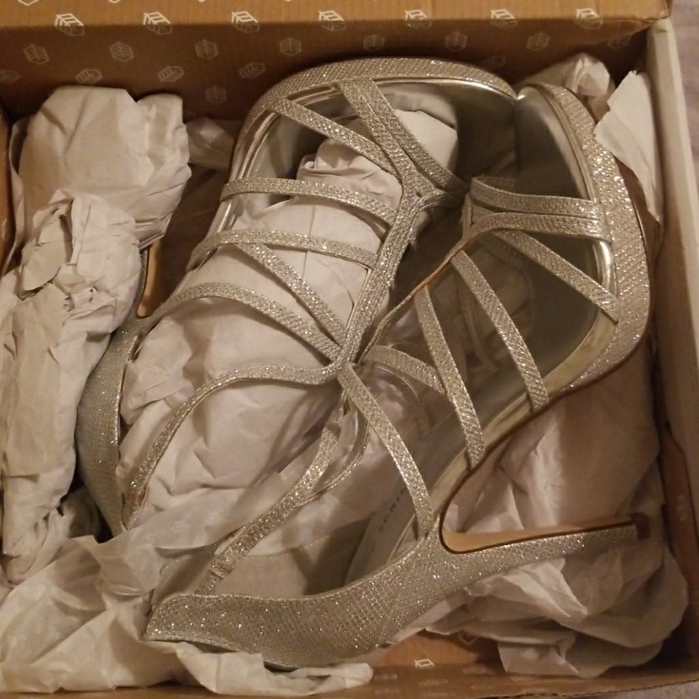 Strappy silver heels