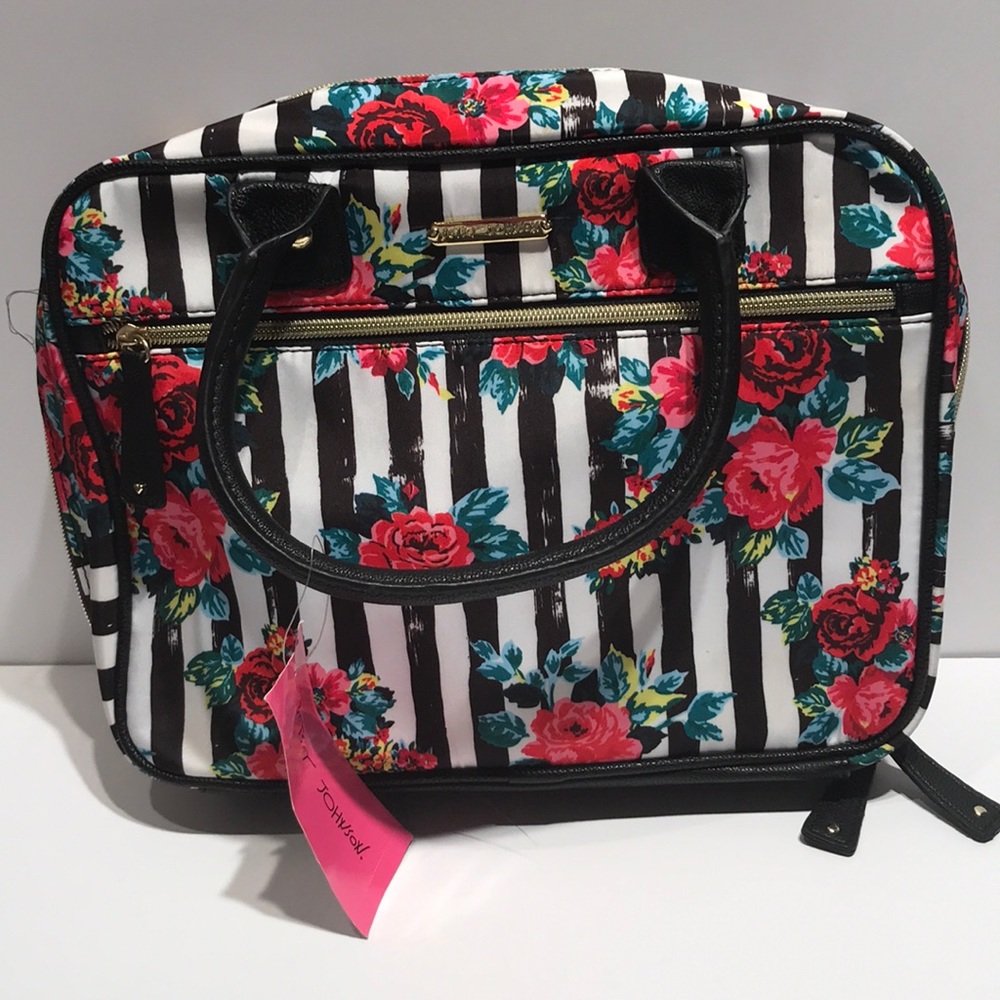 Betsey Johnson floral design large cosmetic bag.