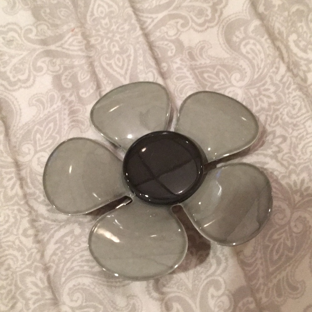 Grey and black pin
