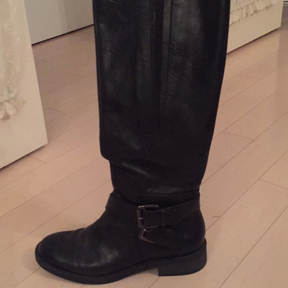 Black leather knee high boots
