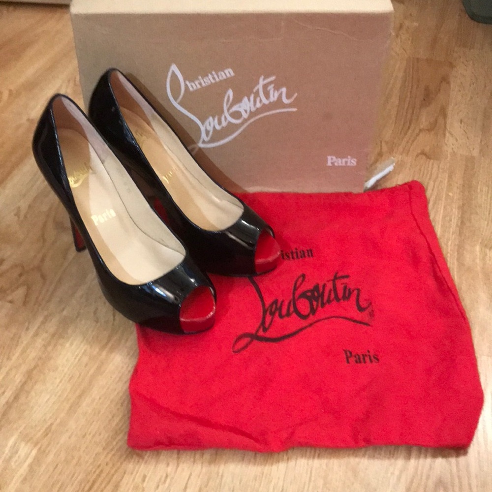 Christian Louboutin peep toe stilettos.  Size 5