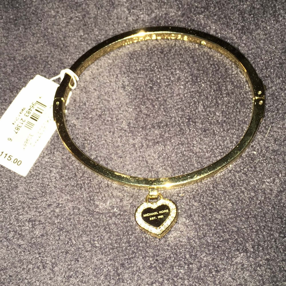 Michael Kors bangle bracelet with a heart charm