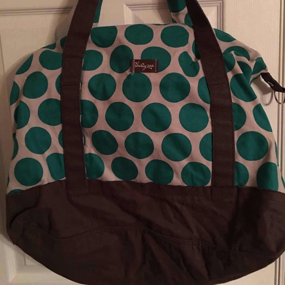 Teal polka dotted weekender/gym/travel bag. 💼