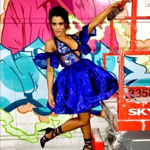 Dress with a cross trim back and tulle bottom